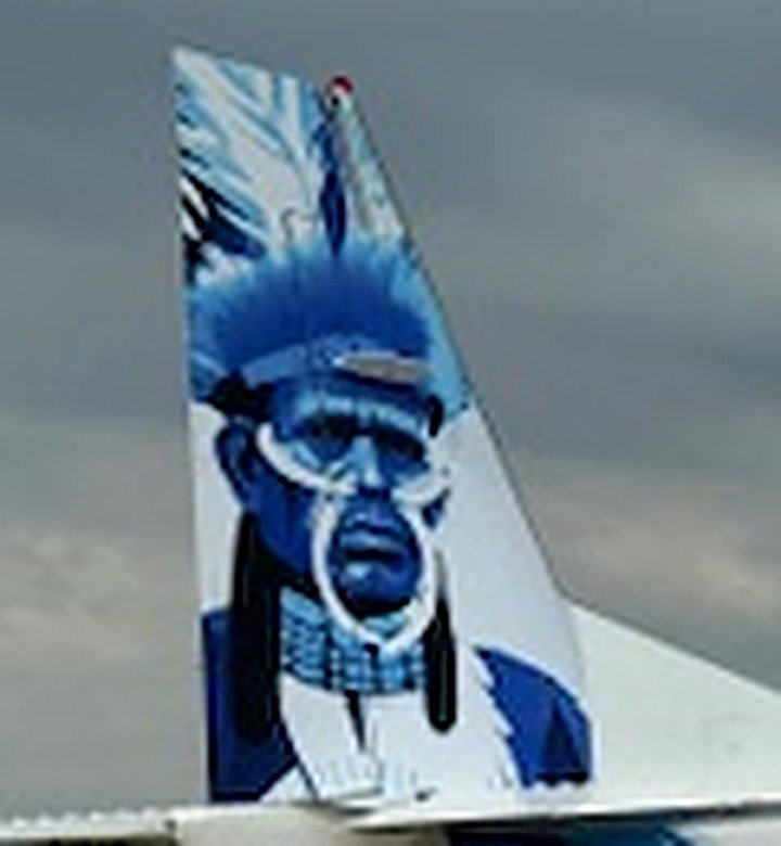 Portrait of a Papuan chief painted on the tail of an Ikairos Grand Caravan